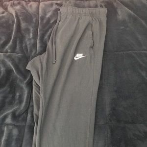 Men’s navy blue Nike jogger pants. Size L